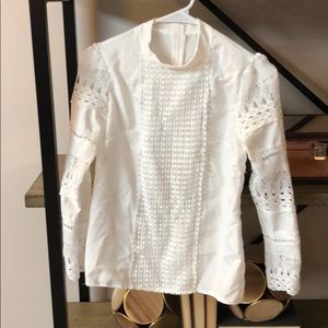 White long sleeved blouse with crocheted sleeves